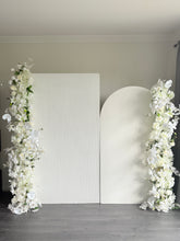 Load image into Gallery viewer, Package Hire includes 2 MDF Wooden backdrops + plinth + 2 faux flowers