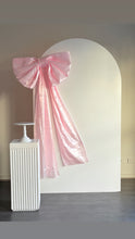 Load image into Gallery viewer, Package Hire includes 1 MDF wooden backdrop 2.15m H x 1.2m W + 1 plinth + Bow