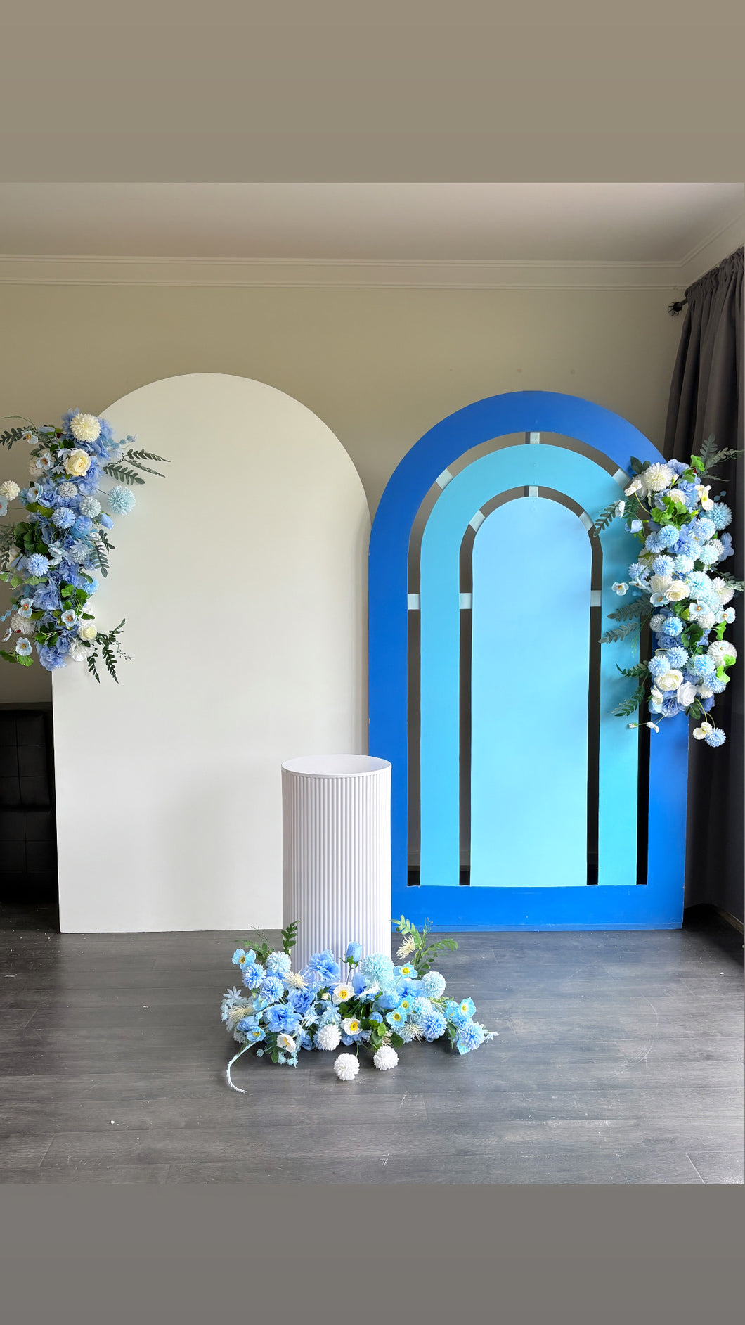 Package Hire includes 2 MDF Wooden backdrops 2m H x 1.2m W each + 3flowers +1 rip plinth