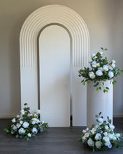 Load image into Gallery viewer, Package Hire includes 1 wooden backdrop 2.15cm h x 1.2m w + 1 ripple plinth + 3 flowers
