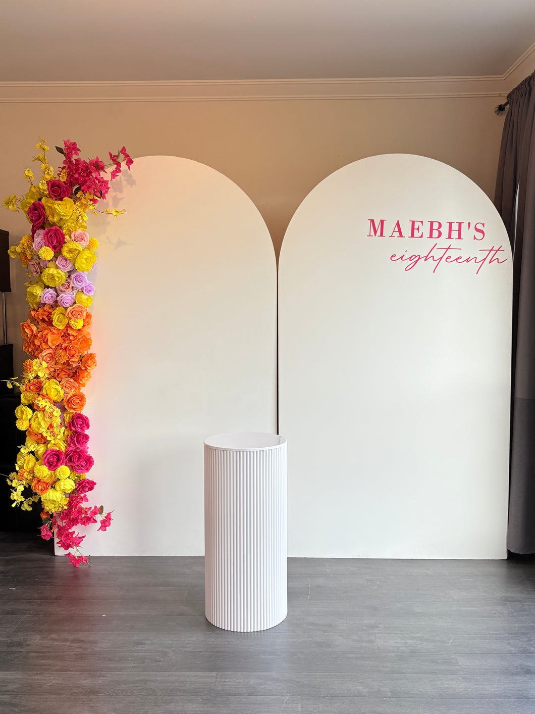 Package Hire includes 2 MDF Wooden backdrops 2.15m H x 1.2m W each +flowers + ripple plinth