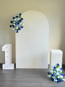 Package Hire includes 1 wooden ripple backdrop 2.15m H x 1.2m W +1 plinth + 2 flowers