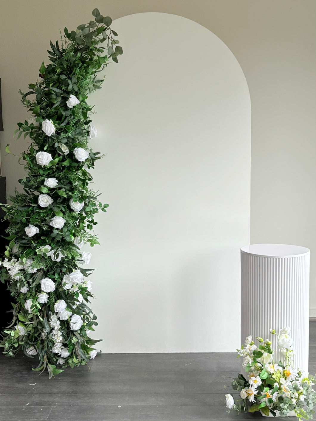 Package Hire includes 1 MDF Wooden backdrops 2.15m H x 1.2m W + 2 flowers +1 ripple plinth