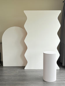 Package Hire includes 2 MDF Wooden backdrops 2.15-1.6m H x 1- 1.2m W each + 1 ripple plinth