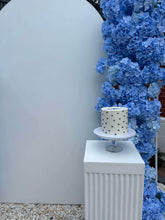 Load image into Gallery viewer, Package Hire includes 1 MDF Wooden backdrop + 1 plinth + 2 flowers
