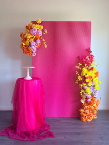 Package Hire includes 1 wooden ripple backdrop 2mH x 1.2m W +1 plinth + 2 flowers