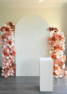 Package Hire includes 1 ripple backdrop + 1 ripple cube plinth + 2 flowers