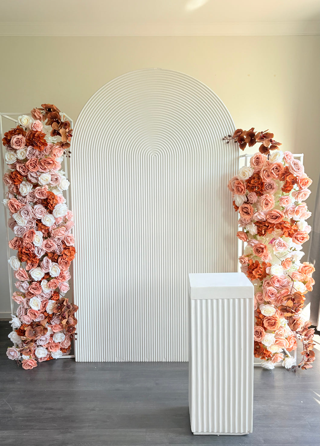 Package Hire includes 1 ripple backdrop + 1 ripple cube plinth + 2 flowers