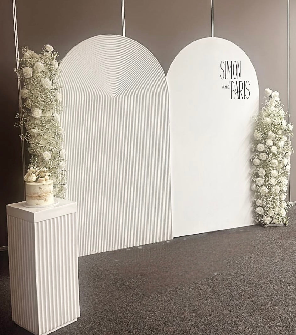 Package includes 2 Mdf wooden backdrops 2.15mH x 1.2m W each + 1 plinth + 2 flowers