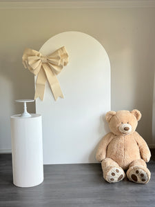 1 Wooden backdrop + 1 ripple plinth + Teddy + Bow, size 2.15m H x 1.2m W