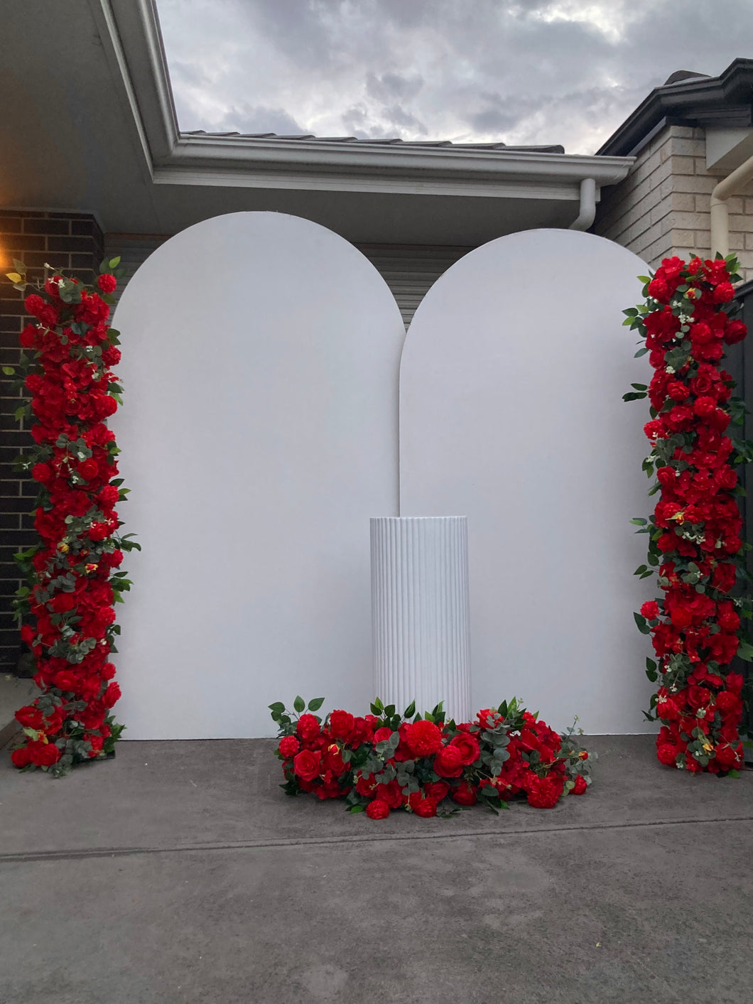 Package Hire includes 2 MDF wooden backdrops + 1 ripple plinth + flowers