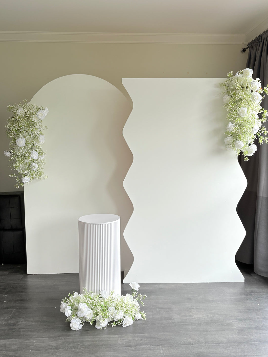 Package Hire includes 2 MDF Wooden backdrops 2m H x 1.2m W each + 3flowers +1 rip plinth