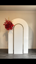 Load image into Gallery viewer, Package hire includes 1 backdrop + 2 flowers + 1 ripple plinth
