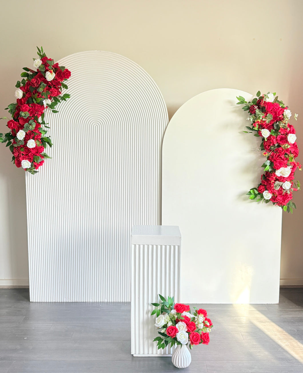 Package Hire includes 2 wooden backdrops 2.15m -1.8mH x 1.2m -1mW + 1 plinth + 3 flowers