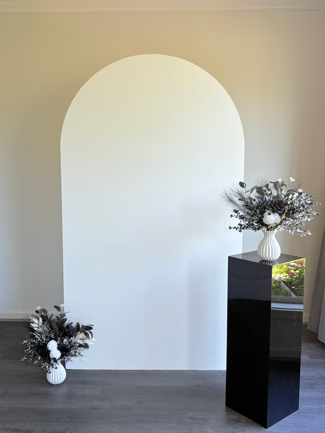 Package hire includes 1 backdrop + 2 flowers + 1 plinth